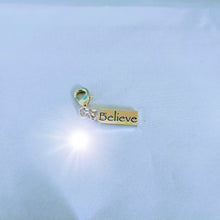 cc14~~~Believe Charm and Zipper Pull